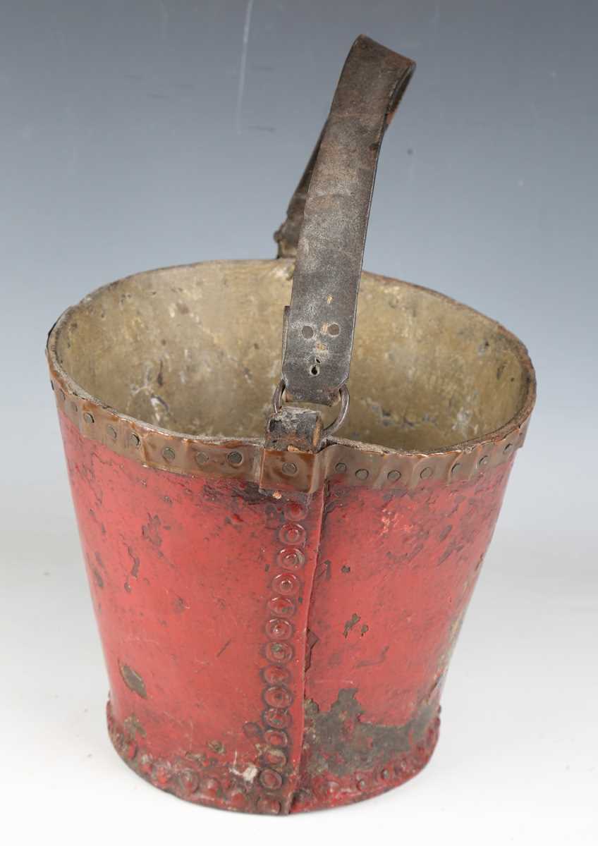 A late 18th/19th century painted leather fire bucket with strap handle and transfer printed royal - Image 6 of 8