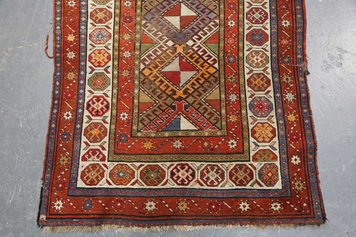 A Kazak runner, Caucasus, early 20th century, the polychrome field with a column of hooked - Image 5 of 6