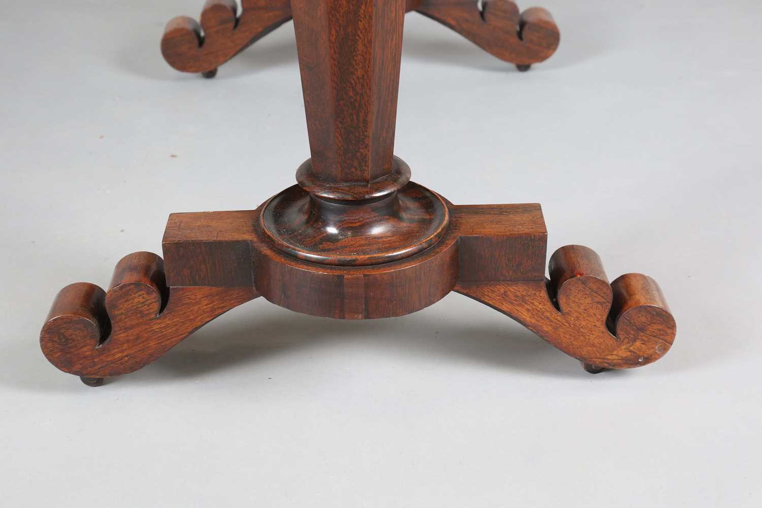 An early Victorian rosewood oval library table, fitted with opposing drawers, on octagonal - Image 8 of 10