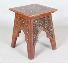An early 20th century Continental Art Nouveau walnut square occasional table, the top and arched