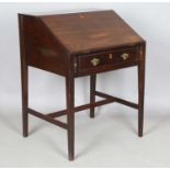 A George III mahogany clerk's desk, the fall front enclosing a fitted interior, height 95cm, width