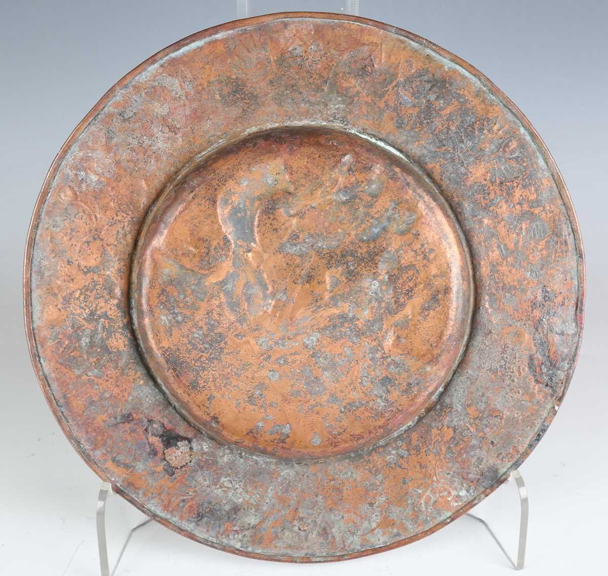 A Newlyn style copper circular charger, worked with a central galleon within a border of fish, - Image 7 of 7