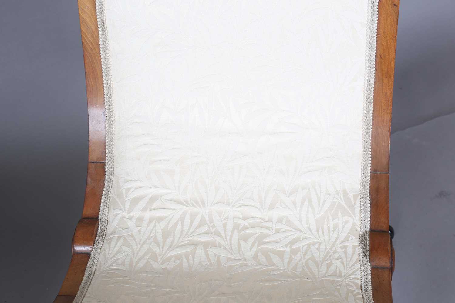 A Victorian walnut showframe balloon back salon chair, upholstered in cream damask, height 86cm, - Image 7 of 14