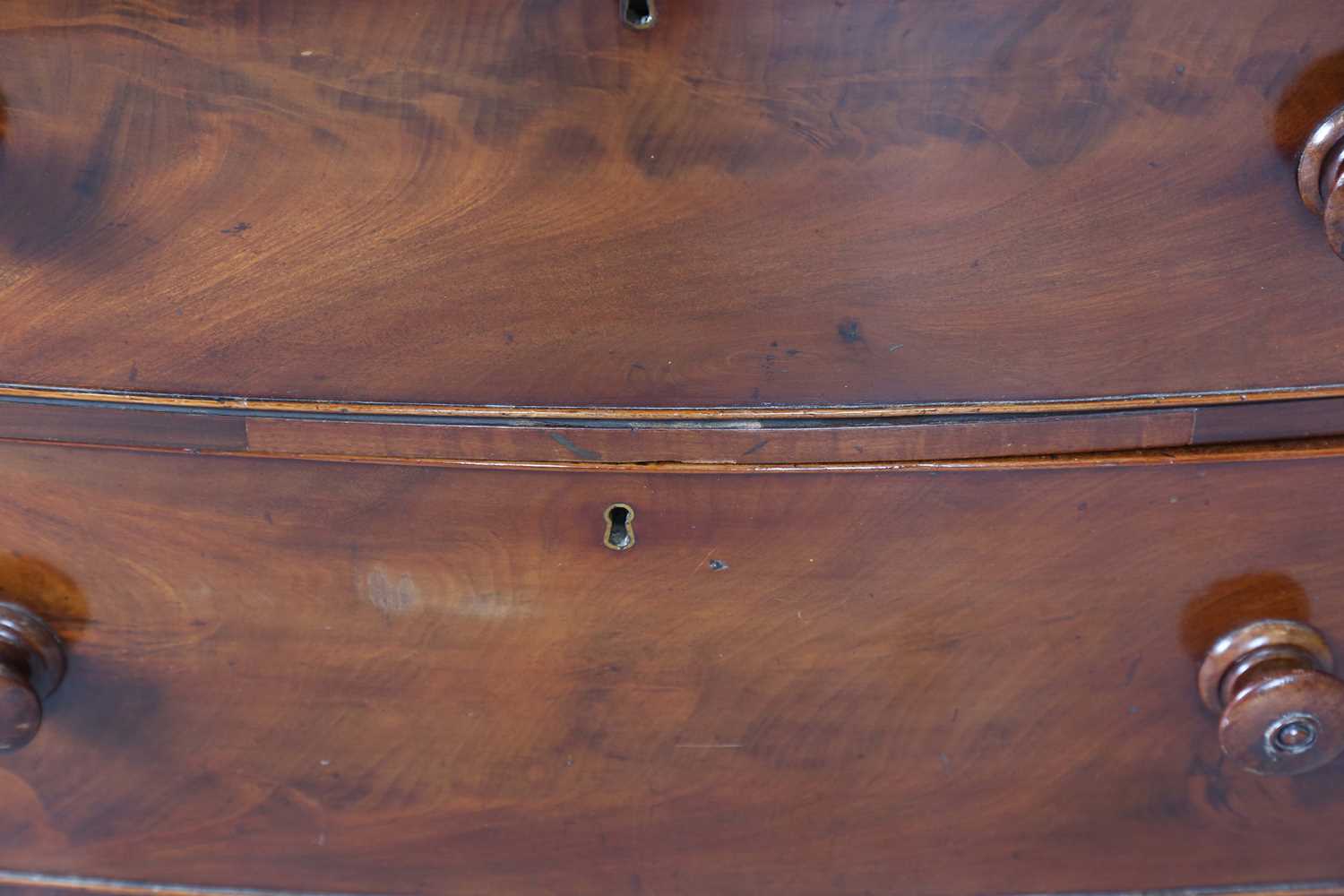 A Victorian mahogany bowfront chest of drawers with reeded pilasters and squat bun feet, height - Image 8 of 11