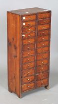 A 19th century pine bank of twenty-four drawers, height 70cm, width 31cm. Provenance: from the