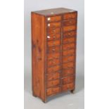 A 19th century pine bank of twenty-four drawers, height 70cm, width 31cm. Provenance: from the