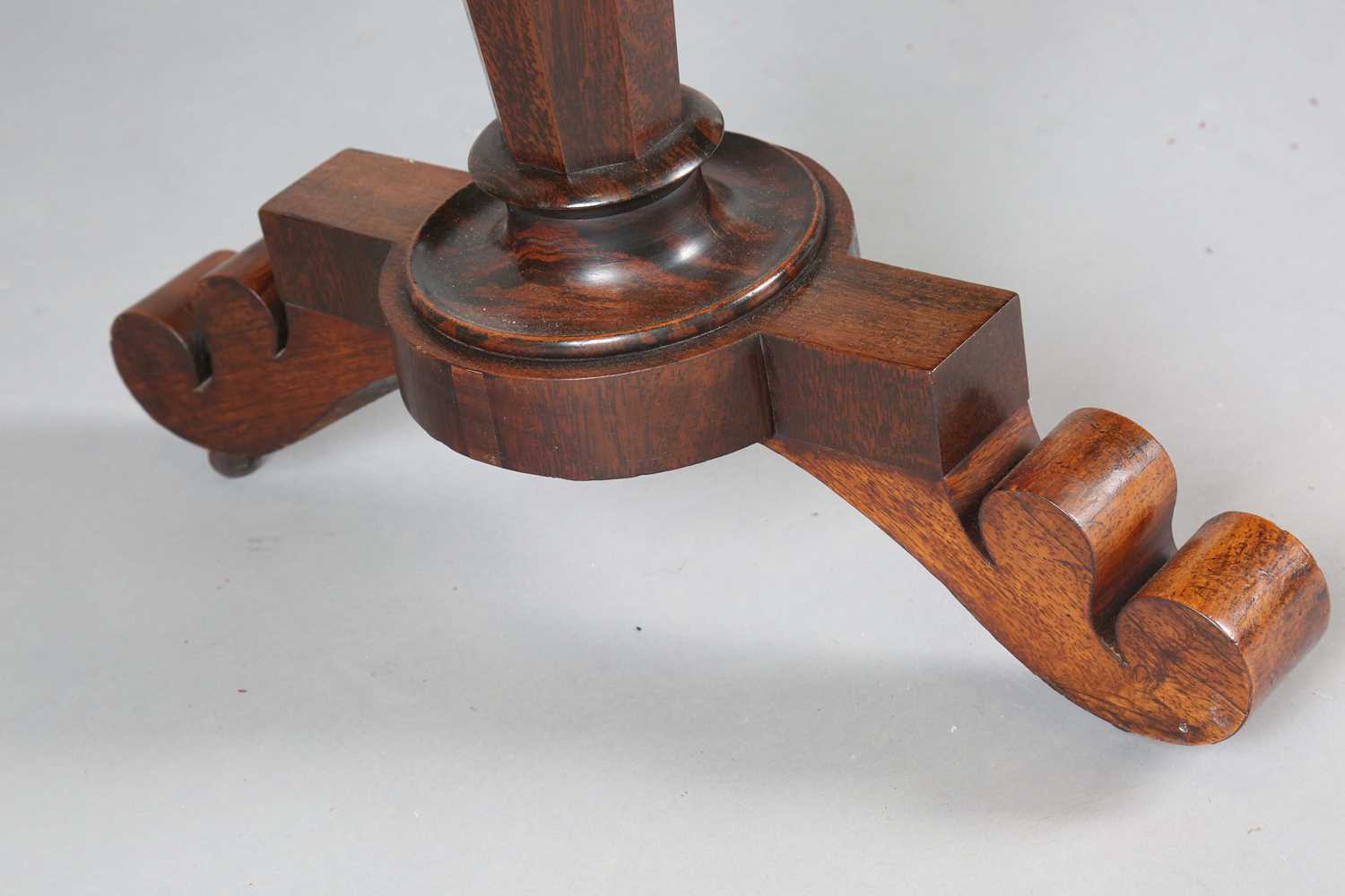 An early Victorian rosewood oval library table, fitted with opposing drawers, on octagonal - Image 5 of 10