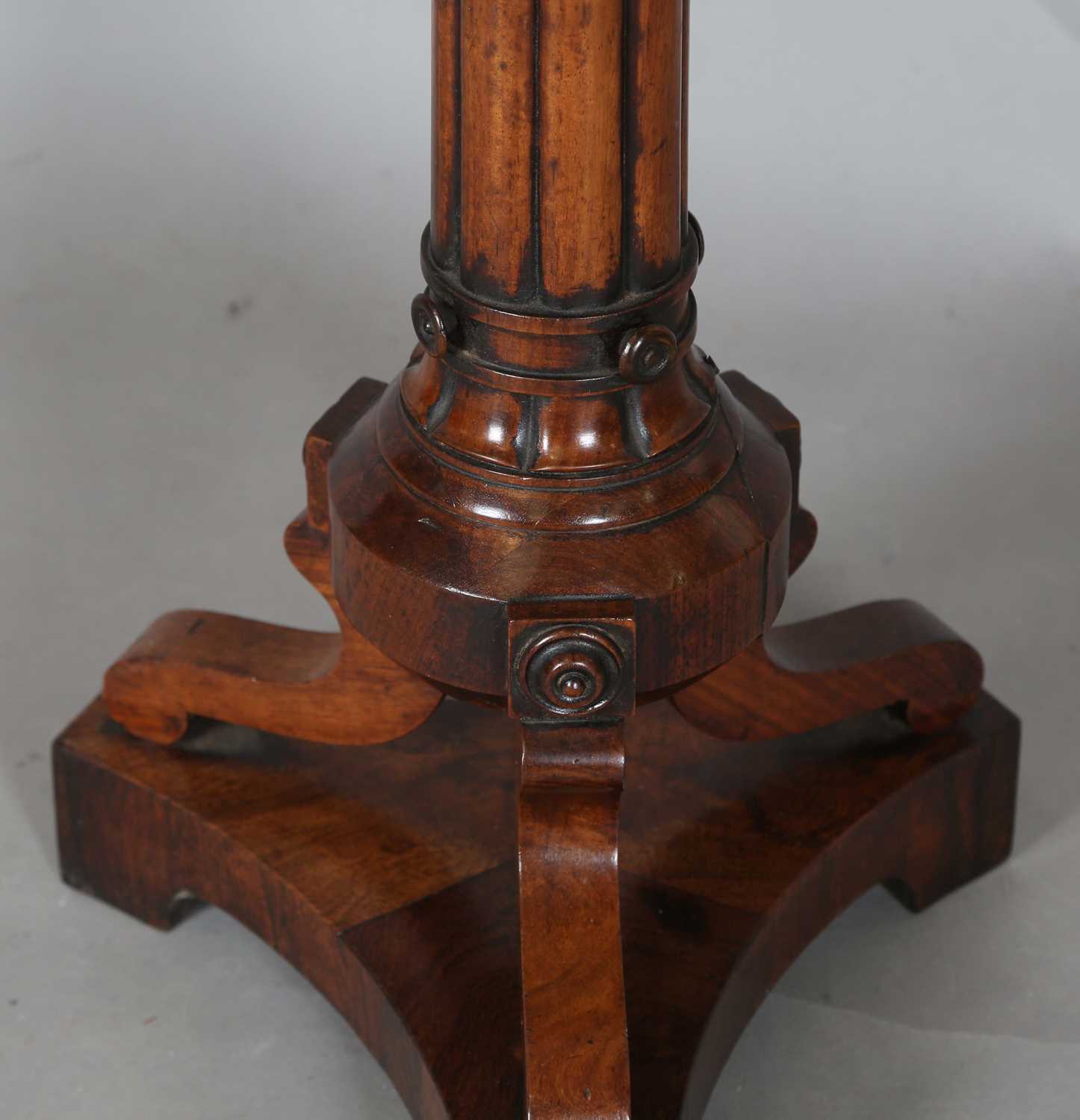 A William IV mahogany torchère, the top fitted with a brass tray above a reeded stem and triform - Image 7 of 9