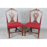 A pair of George III Chippendale period mahogany dining chairs with pierced splat backs and