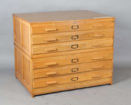 A mid-20th century oak plan chest of six drawers, height 91cm, width 114cm, depth 81cm. Note: from