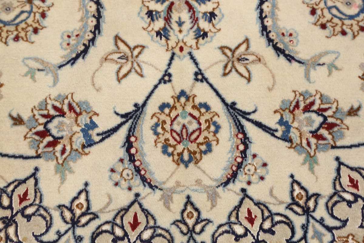 A Nain carpet, Central Persia, late 20th century, the cream field with a flowerhead medallion and - Image 7 of 8