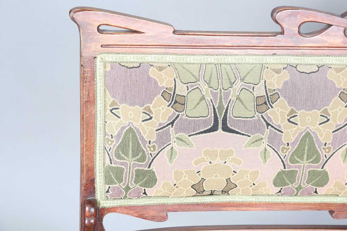 An Art Nouveau stained beech three-piece salon suite with pierced showframe and contemporary fabric, - Image 2 of 27