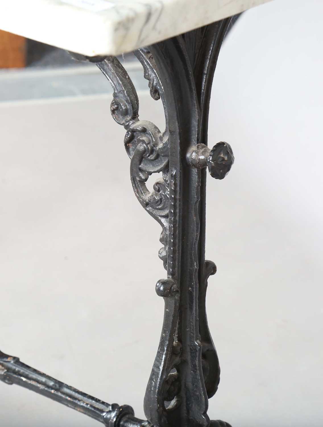 A late 19th century cast iron bistro table with a rectangular white marble top, height 76cm, - Image 8 of 8