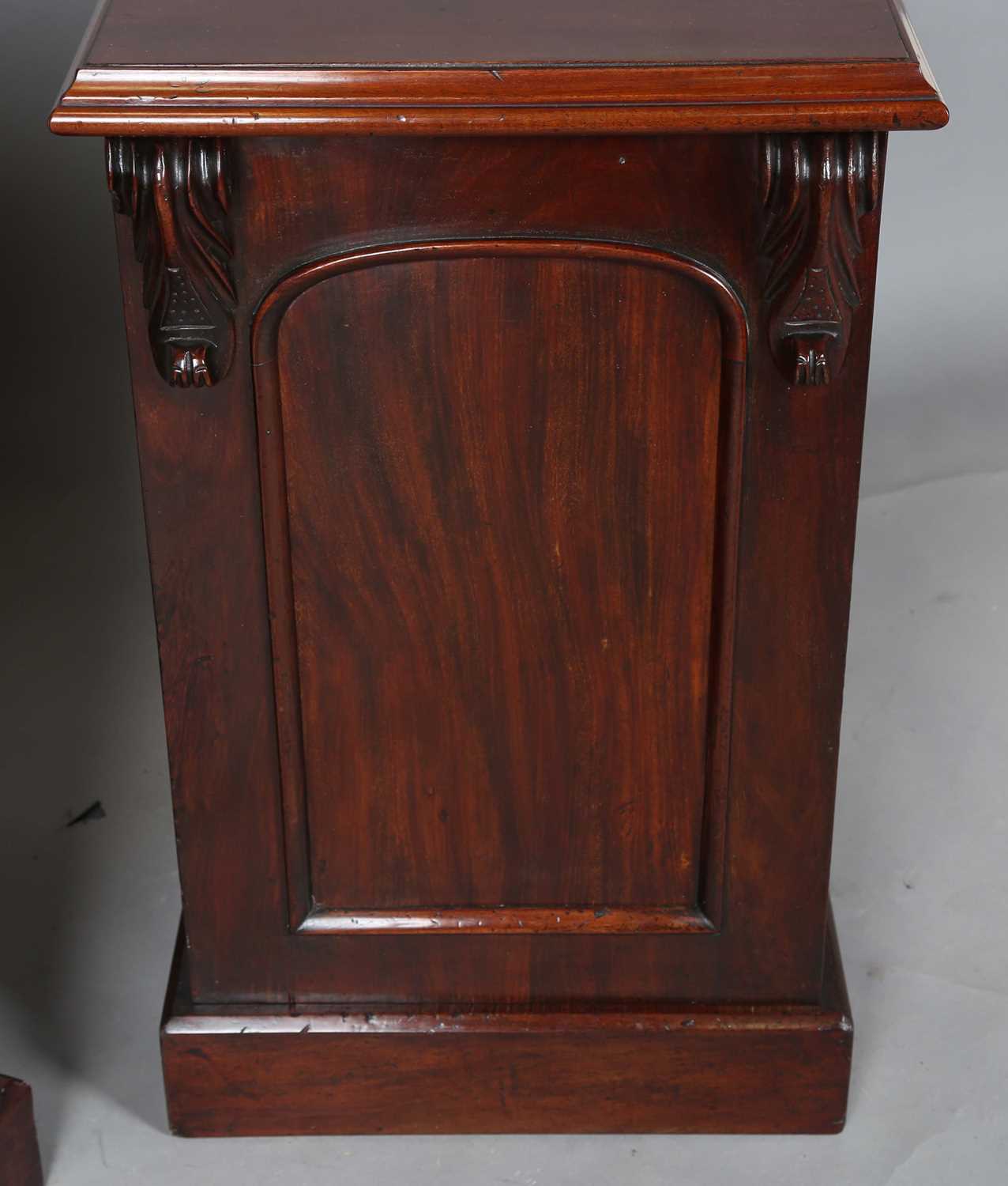 A pair of Victorian and later mahogany pedestal cabinets, each fitted with an arched panel door, - Image 6 of 10