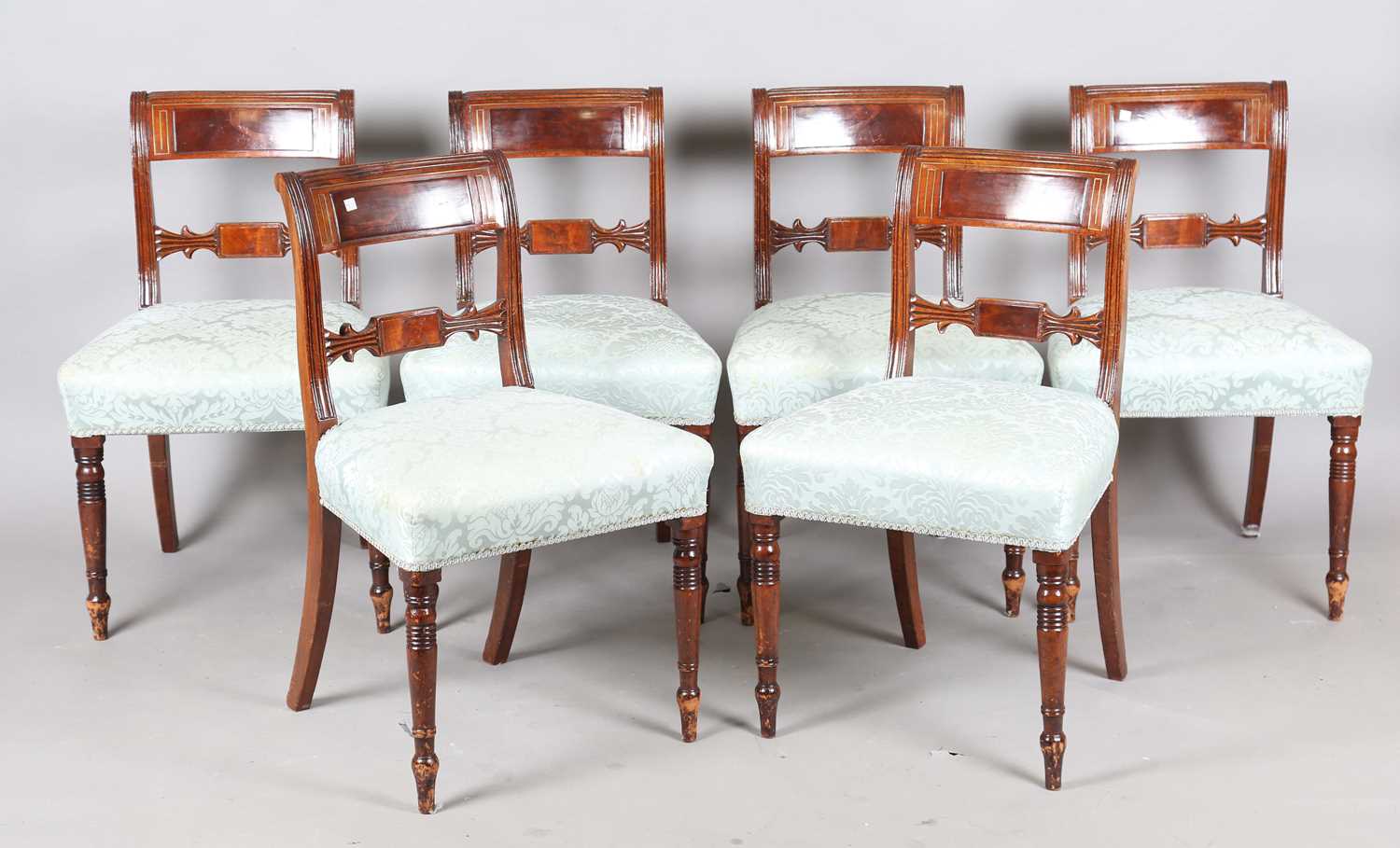 A set of eight Regency mahogany and brass inlaid bar back dining chairs, comprising two carvers, - Image 13 of 17