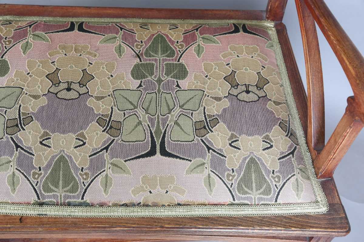 An Art Nouveau stained beech three-piece salon suite with pierced showframe and contemporary fabric, - Image 7 of 27