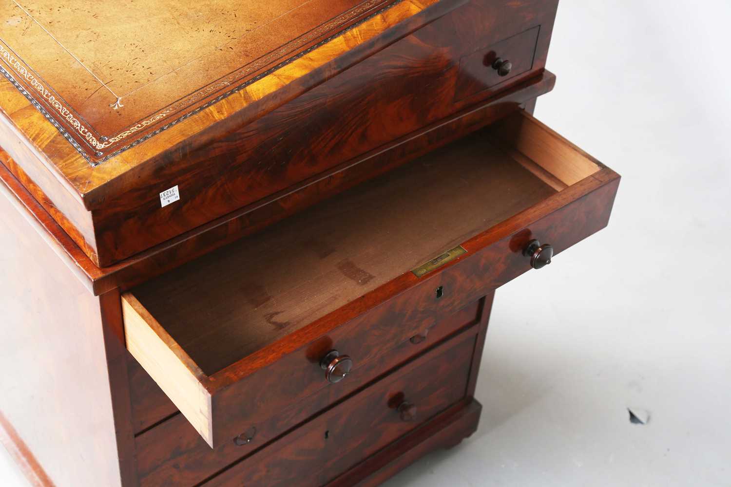A good early Victorian flame mahogany Davenport, the hinged writing slope inset with tooled - Image 9 of 12