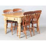 A set of four late 19th century ash and beech comb back kitchen chairs, height 89cm, width 47cm,