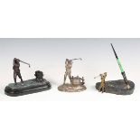 A 20th century plated cast metal novelty inkwell in the form of a golfer in full swing, height 13cm,