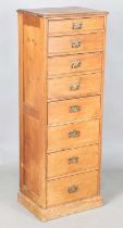 A late Victorian pine narrow chest of eight drawers, height 125cm, width 44cm, depth 33cm,