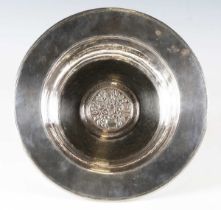 An early 20th century Arts and Crafts plated copper deep welled dish, in the manner of Omar Ramsden,