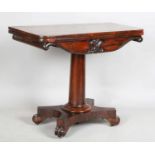 An early Victorian rosewood fold-over card table, raised on a quatrefoil base, height 74cm, width