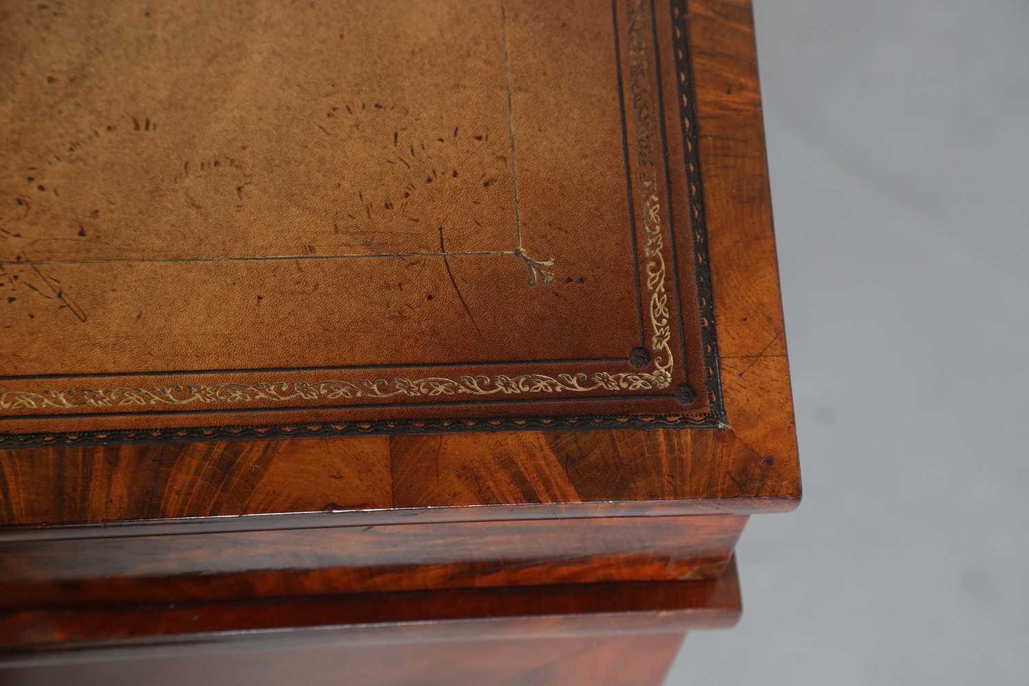 A good early Victorian flame mahogany Davenport, the hinged writing slope inset with tooled - Image 3 of 12