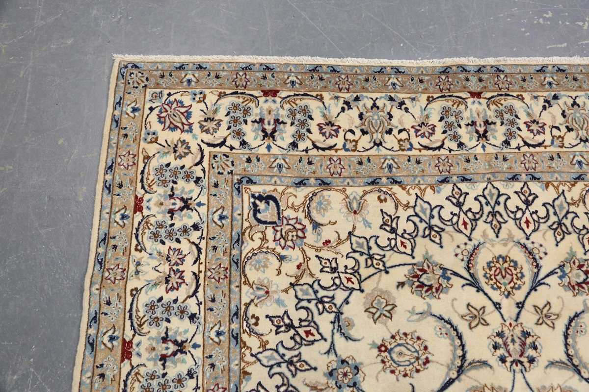 A Nain carpet, Central Persia, late 20th century, the cream field with a flowerhead medallion and - Image 2 of 8
