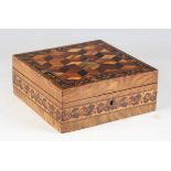 A Victorian Tunbridge ware square box, the hinged lid with a geometric cuboid inlaid panel within