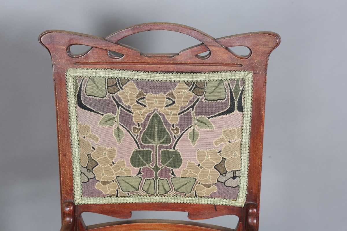 An Art Nouveau stained beech three-piece salon suite with pierced showframe and contemporary fabric, - Image 21 of 27