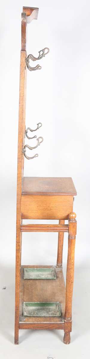 An Edwardian Arts and Crafts oak hallstand, the pediment pierced with stylized tulips, height - Image 13 of 15