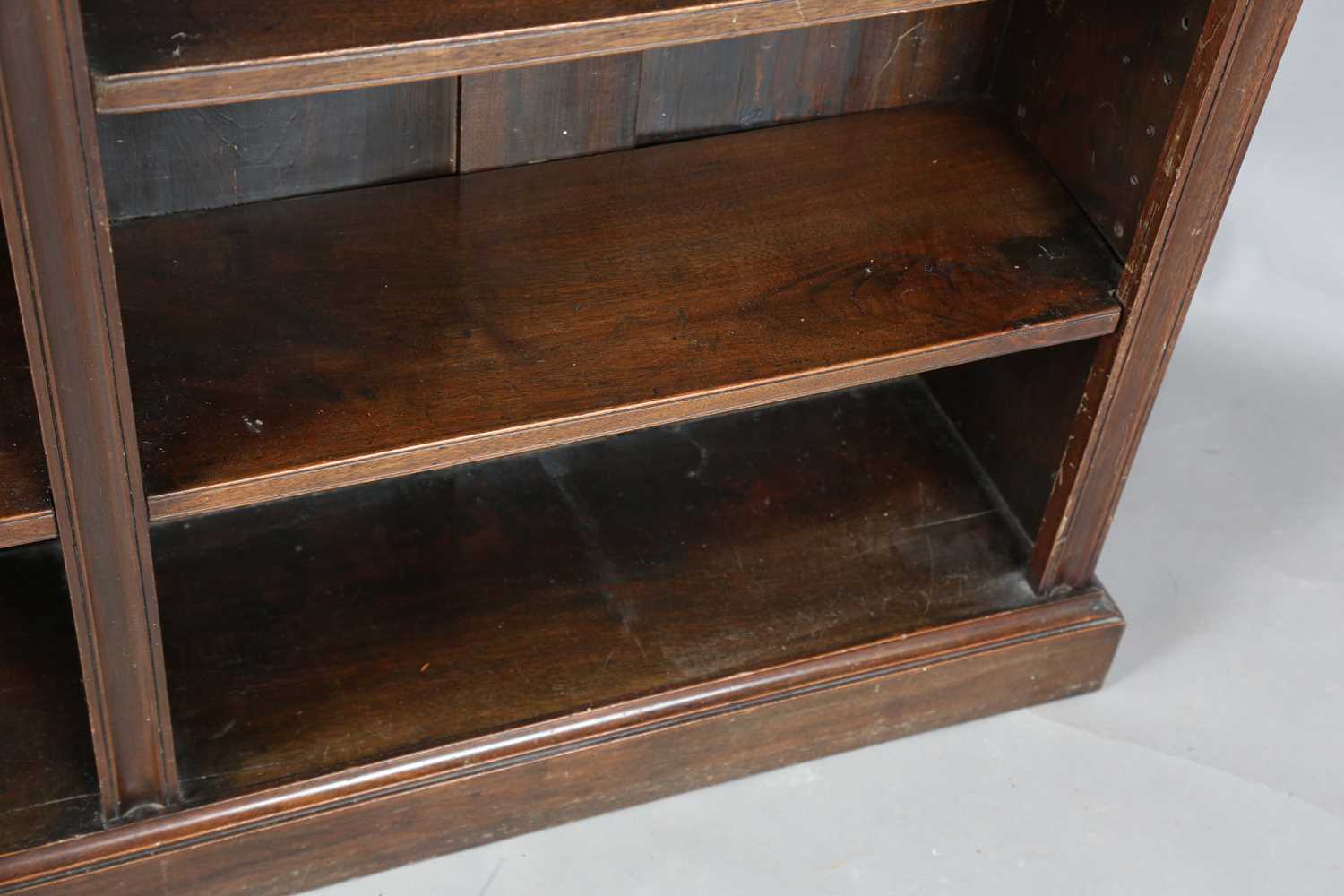 An Edwardian walnut two-section open bookcase with a brass three-quarter gallery, on a plinth - Image 8 of 11