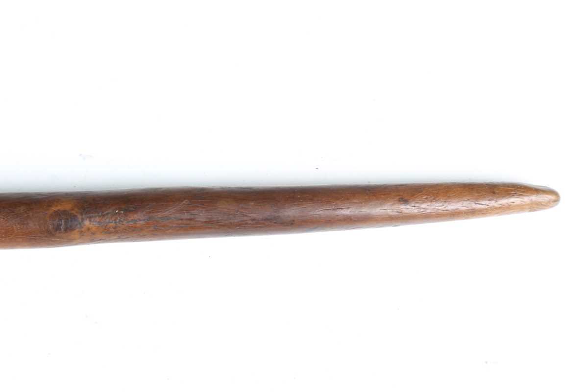 A 19th century patinated treen distaff, probably Greek, the shaped crosspiece finely incised with - Image 6 of 12