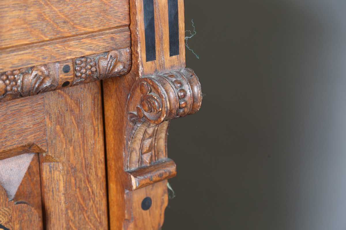 A pair of late Victorian Aesthetic Movement oak cabinets, in the manner of Charles Bevan, the - Image 7 of 16