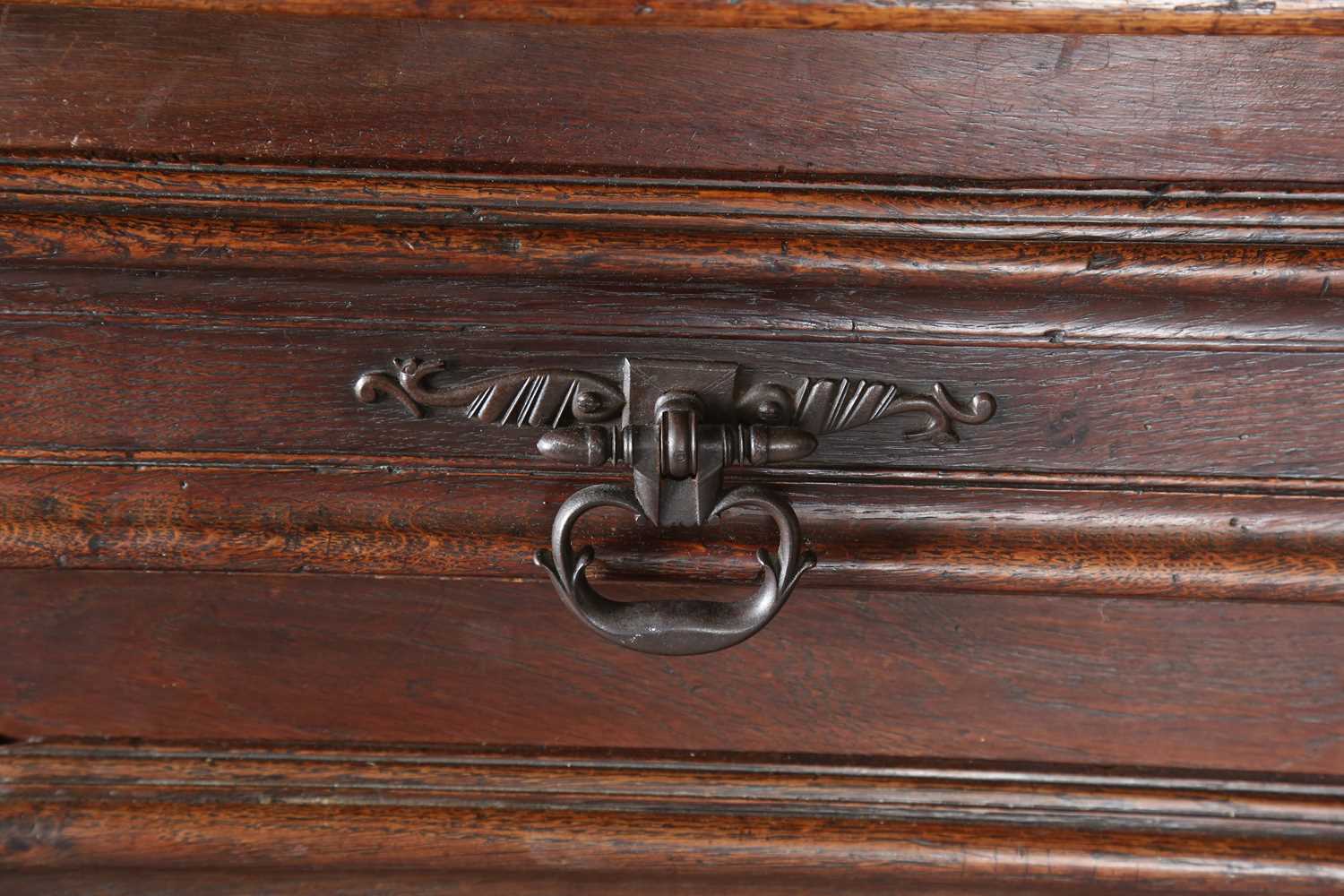 A large 18th century Continental oak cupboard, fitted with four panelled doors and two drawers, - Image 7 of 17