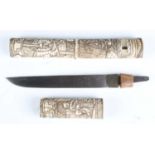 A late 19th century Japanese tanto with straight single-edged blade, blade length 18cm, and carved
