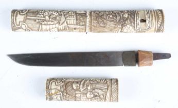 A late 19th century Japanese tanto with straight single-edged blade, blade length 18cm, and carved