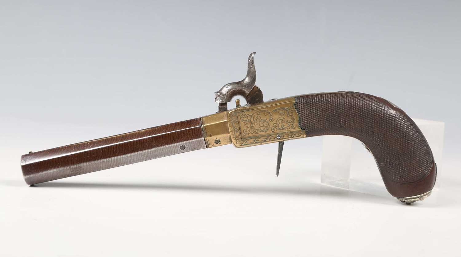 An early 19th century percussion pistol by Musgrove, Glasgow, with sighted octagonal turn-off barrel