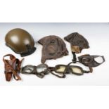 A collection of various Australian and other military items, including a flying helmet, dated '