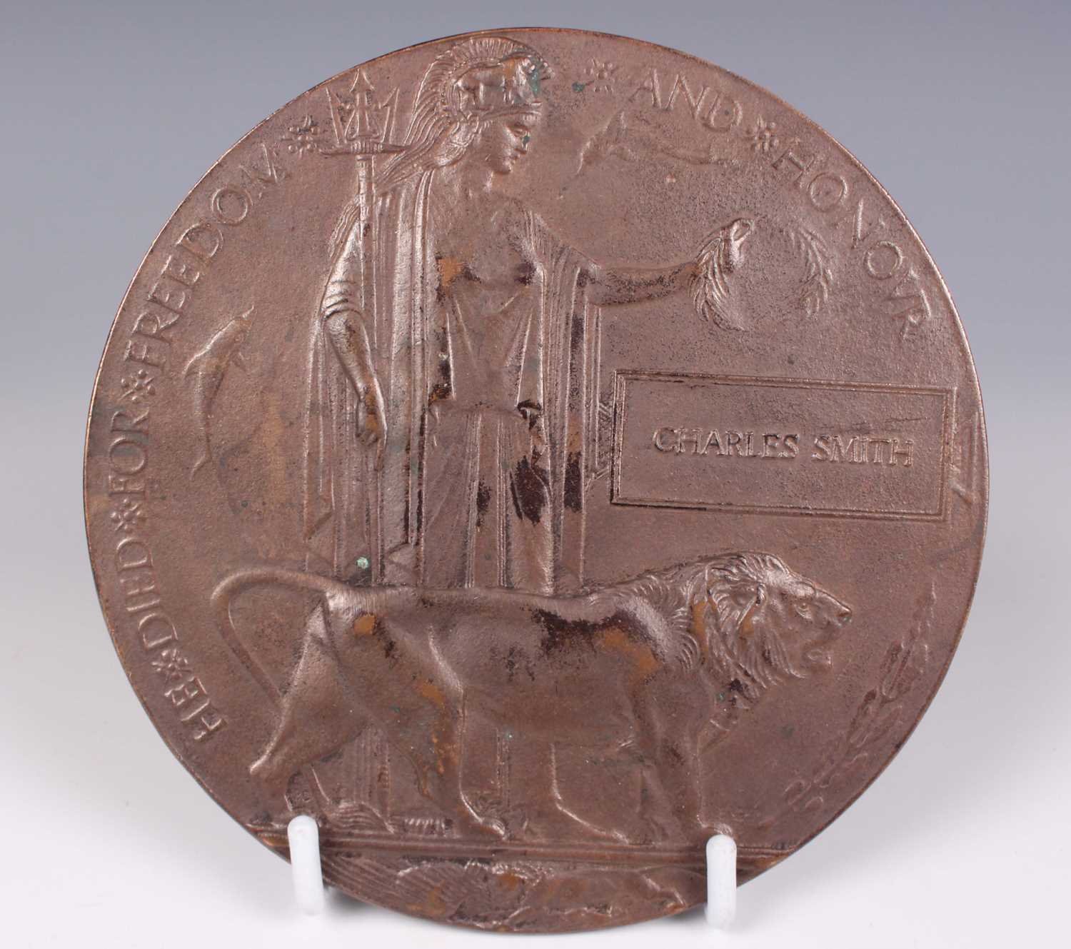 A First World War period bronze memorial plaque, detailed ‘Charles Smith’, with the original folding - Image 2 of 2