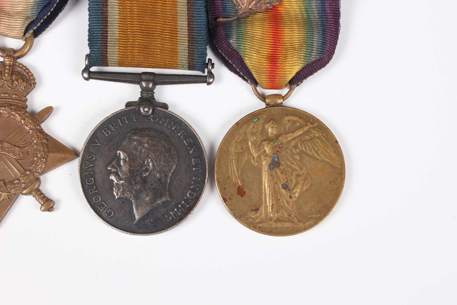 A group of four First World War period medals, comprising OBE, military issue, London 1929, 1914- - Image 4 of 9