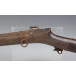 A 19th century Middle Eastern matchlock long rifle with sighted shaped barrel, barrel length 120.