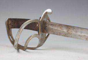 A British 1853 pattern cavalry sword by Kirschbaum, Solingen, with curved single-edged blade,