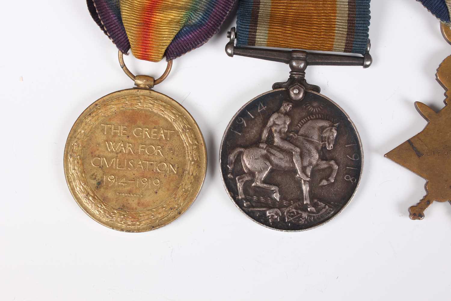 A group of four First World War period medals, comprising OBE, military issue, London 1929, 1914- - Image 6 of 9