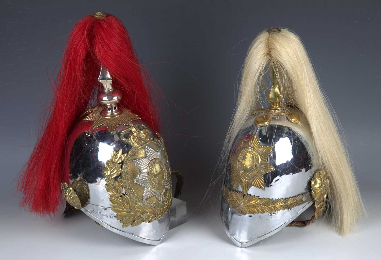 Two mid-20th century Household Cavalry and other Albert pattern parade helmets with applied