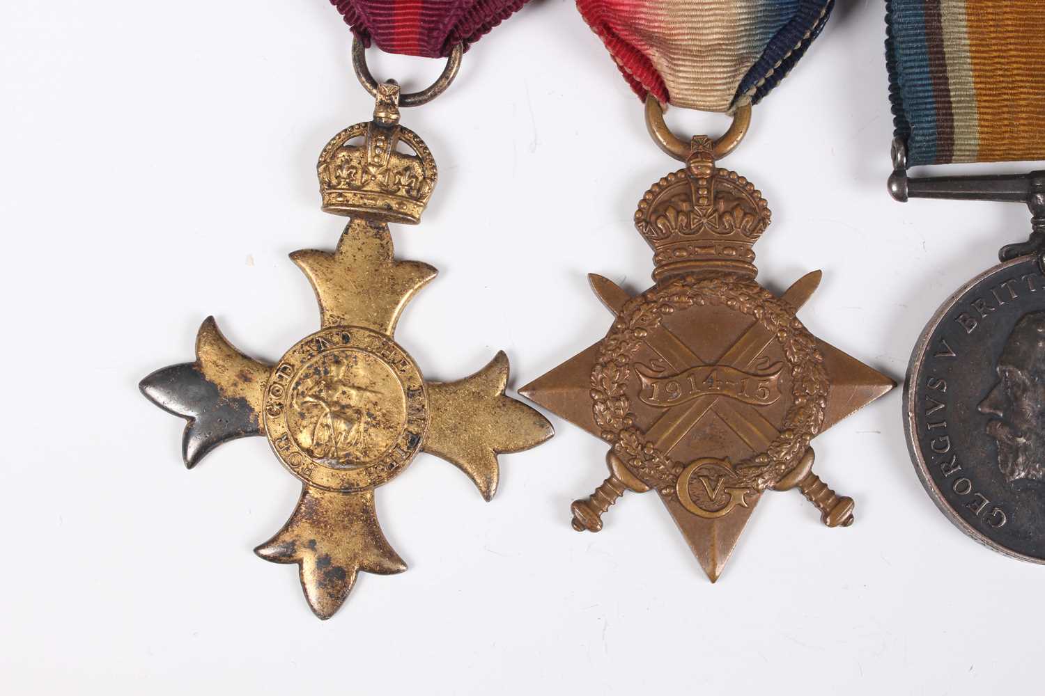 A group of four First World War period medals, comprising OBE, military issue, London 1929, 1914- - Image 3 of 9