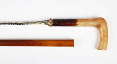 A late 19th/early 20th century swordstick with diamond-section blade with blued and gilt decoration,
