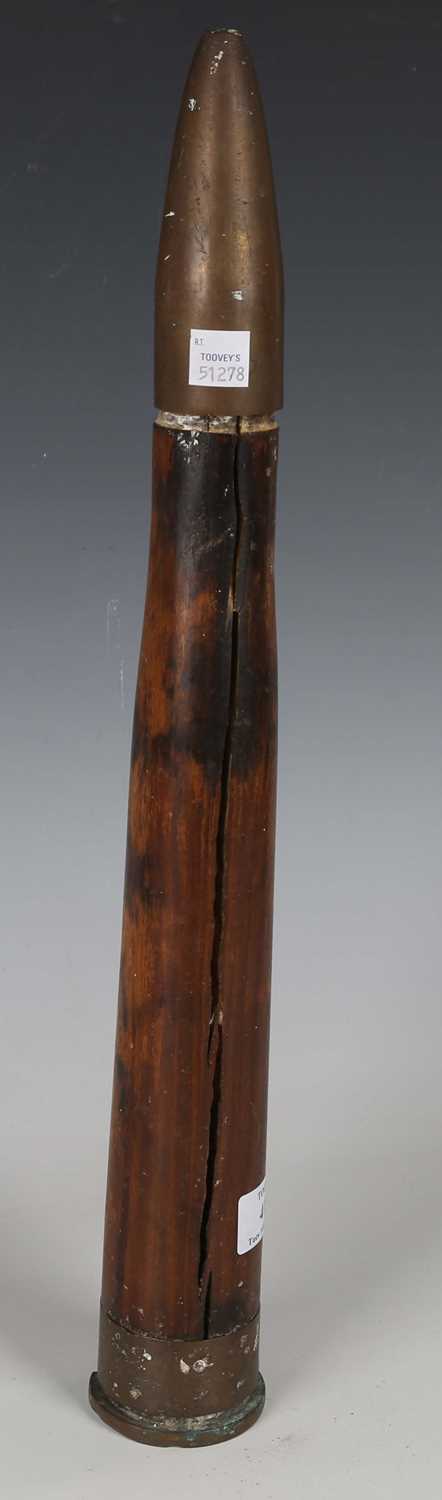 A Second World War period brass-mounted wooden practice shell (deep crack to length of wood - Image 3 of 4