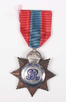 An Imperial Service medal, George V issue, to ‘Edward G. Ash’.