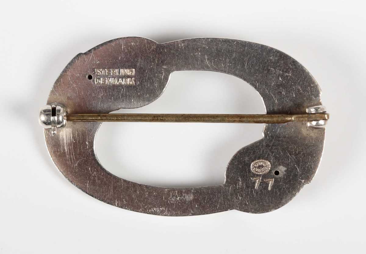 A Georg Jensen sterling silver brooch of shaped oval openwork form, detailed ‘Georg Jensen - Image 2 of 3